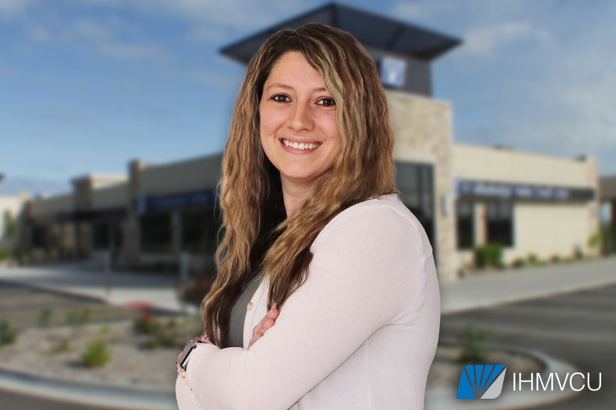 Credit union branch staff outside of bank